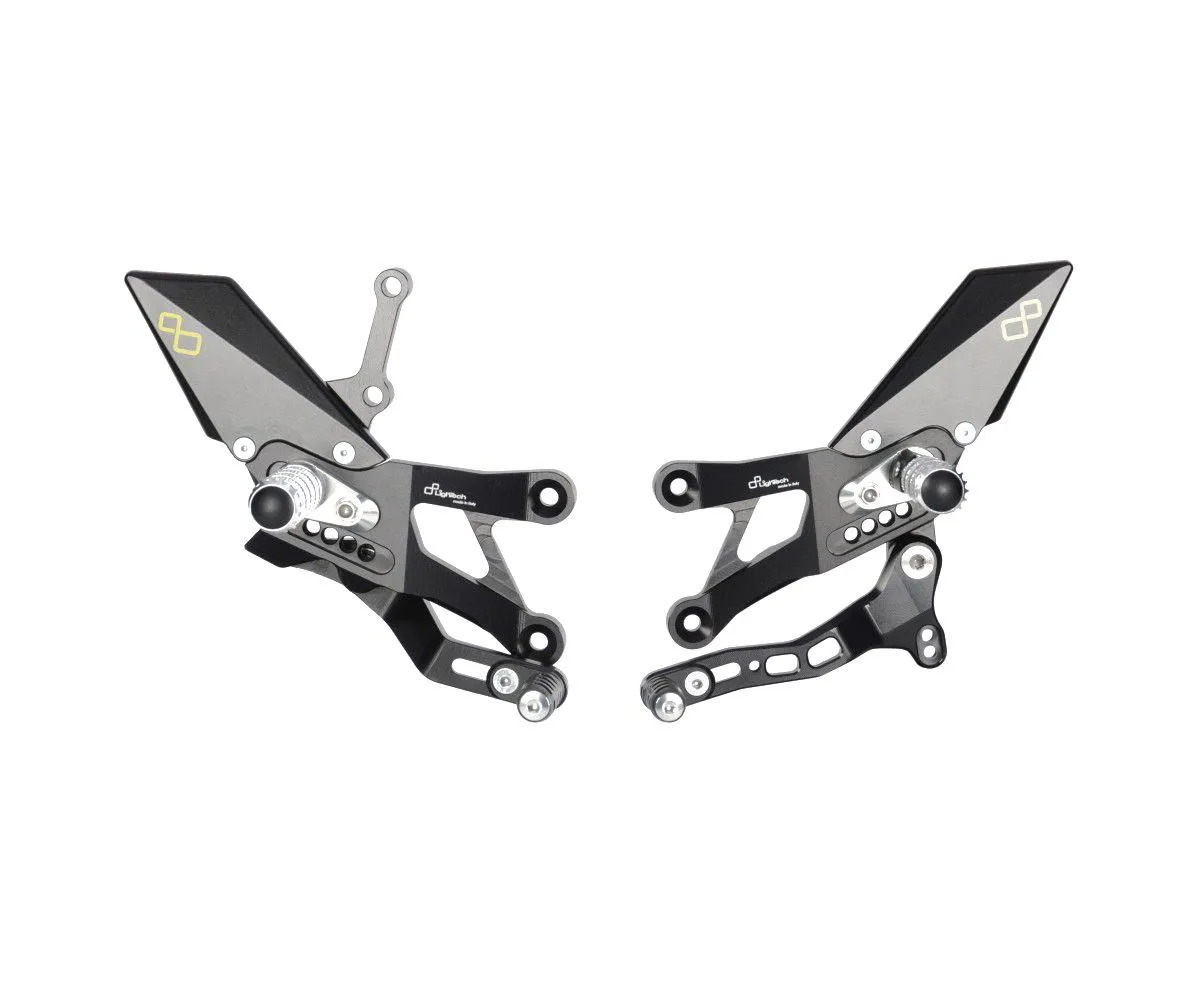 Pedane Regolabili Con Poggia Piedi Fissi Lightech Per Yamaha R3 2015 > 2023-FTRYA013-384583
